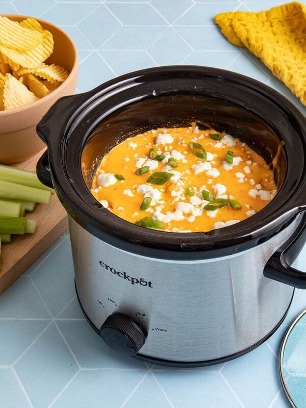 crockpot buffalo chicken dip in a slow cooker
