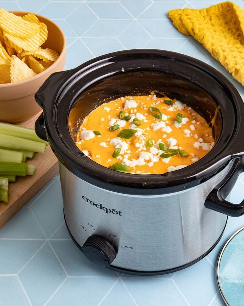 crockpot buffalo chicken dip in a slow cooker