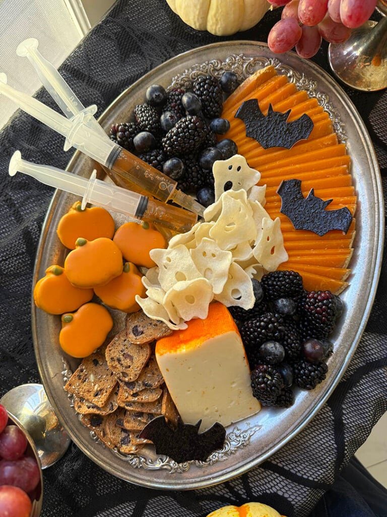 Halloween cheese board with mimolette